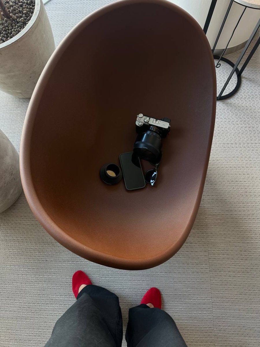 Camera and phone on a studio chair